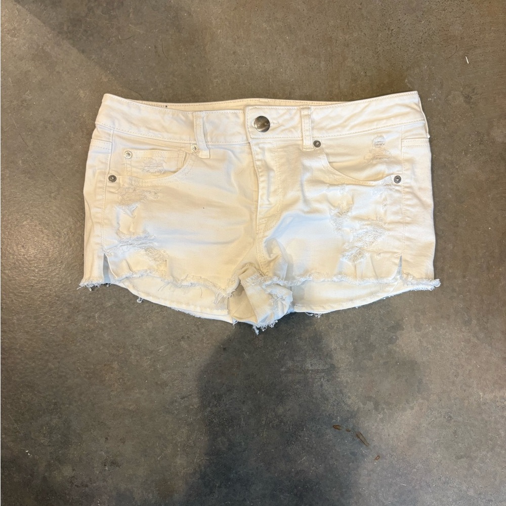 American Eagle Outfitters Cream Distressed Shorts